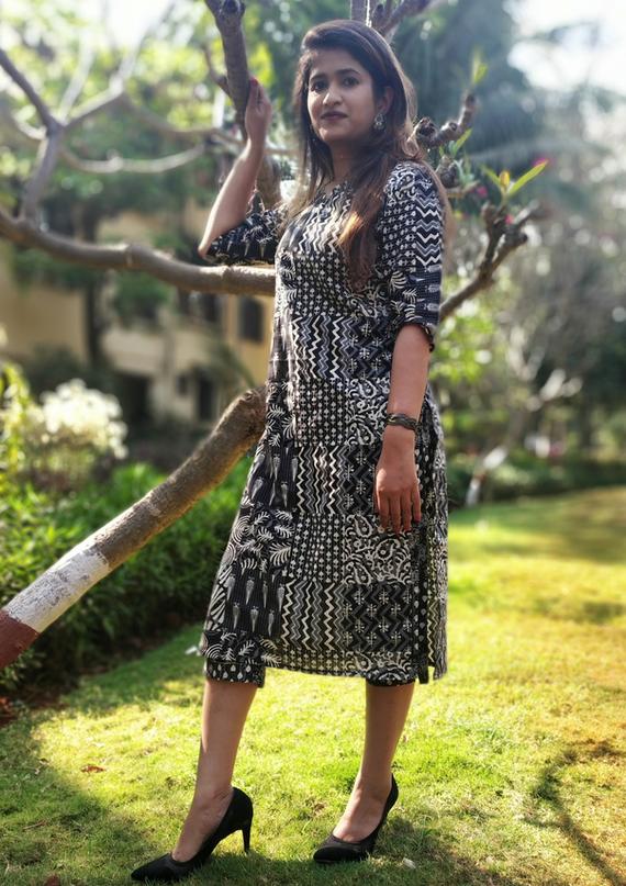 Buy online Black Printed Flared Short Kurti from Kurta Kurtis for Women by  Showoff for ₹1269 at 70% off | 2024 Limeroad.com